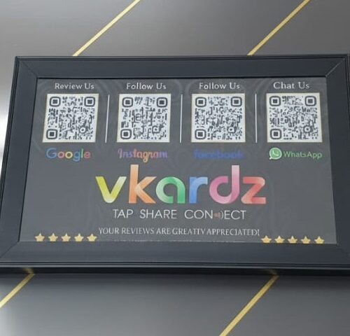 Framed NFC LED social sign with QR codes for Google Reviews, Instagram, Facebook, and WhatsApp.